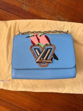 Auth. Louis Vuitton Twist Bag Light Blue Epi Leather with Sequin Birds Medium